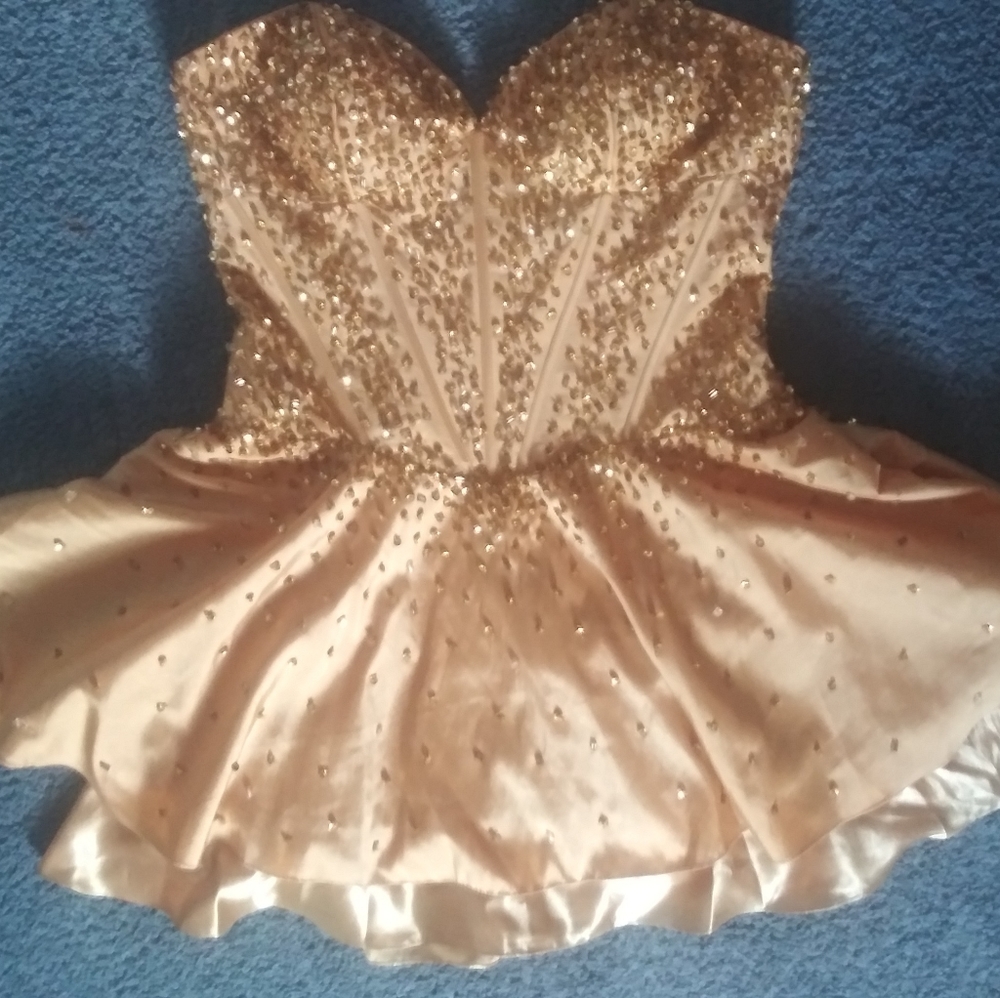 Women's gold, sparkly party dress